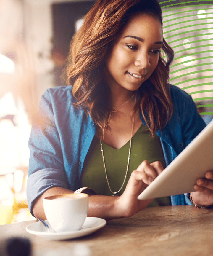 Cropped shot of a young businesswoman working on a laptop in a modern office