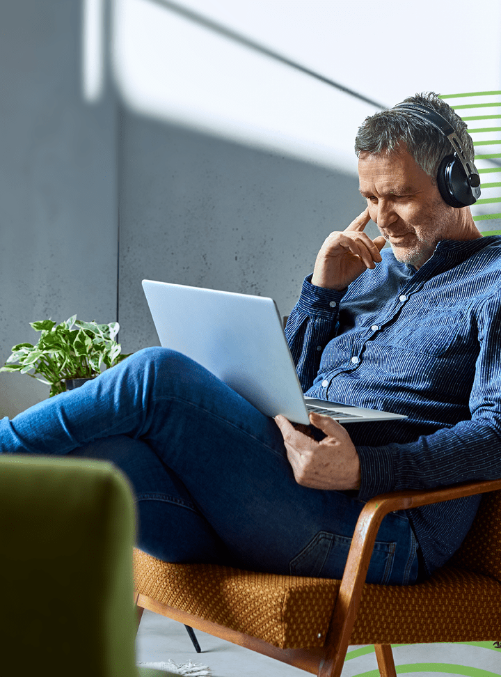 Cropped shot of a young businesswoman working on a laptop in a modern office