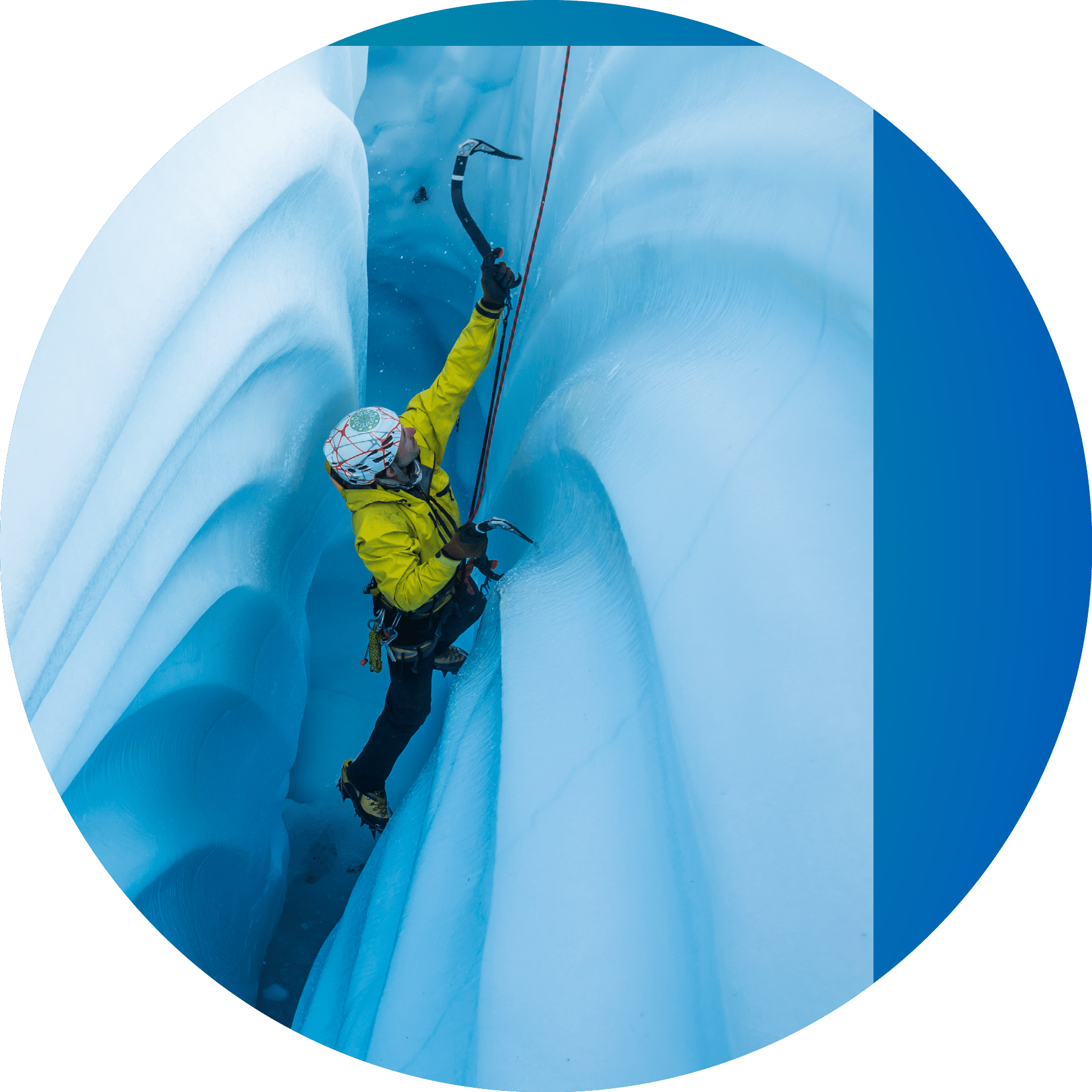 Ice climber ascending a narrow passage inside a glacier ice cave with wavy lines from melting ice cutting into the walls 
