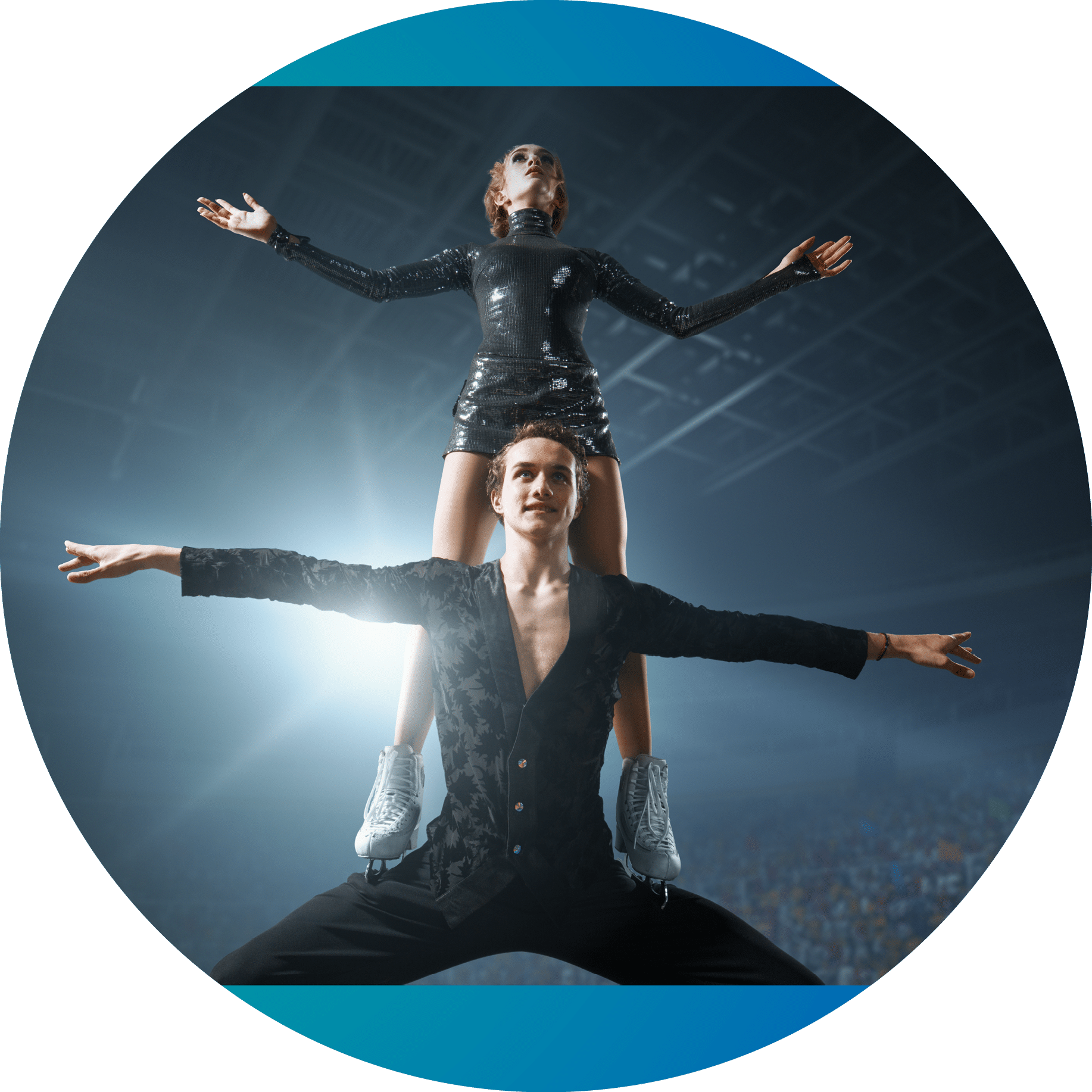 Figure skating  Sports ice skaters couple performs a complicated trick on the professorial ice rink  Ice skaters stand on the ice in the rays of light 