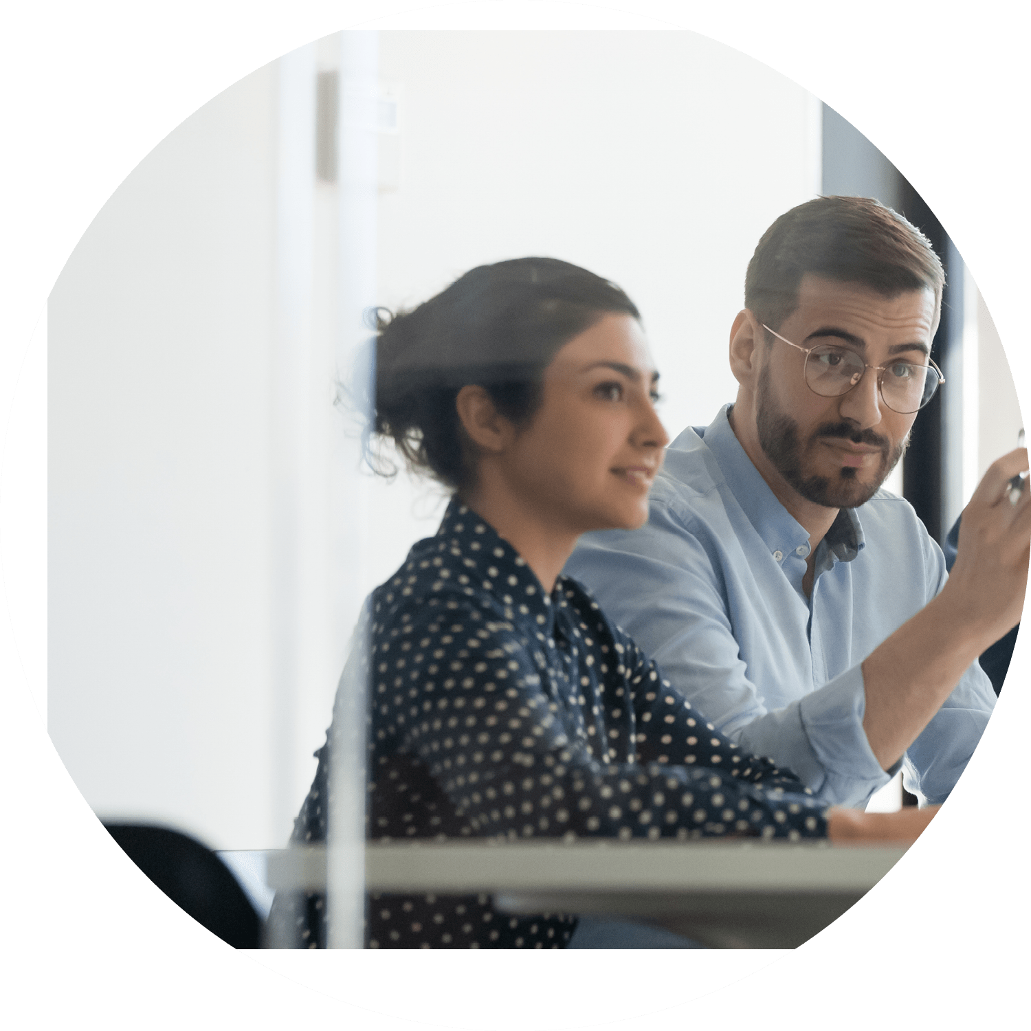 Serious male boss team leader hr recruiter talking to businesswoman client applicant at job interview or corporate briefing sit at table, businessman executive negotiating at diverse group meeting